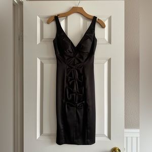 Pre-Loved and I’m excellent condition Cache dress size 2.